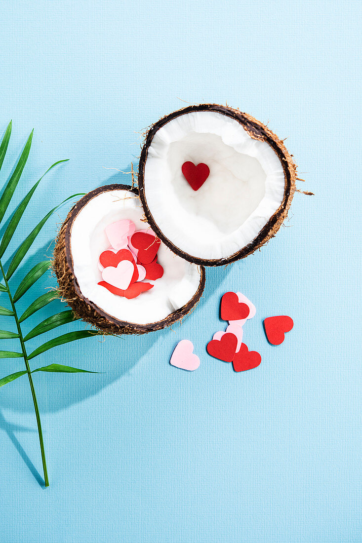 Open coconut and paper heart
