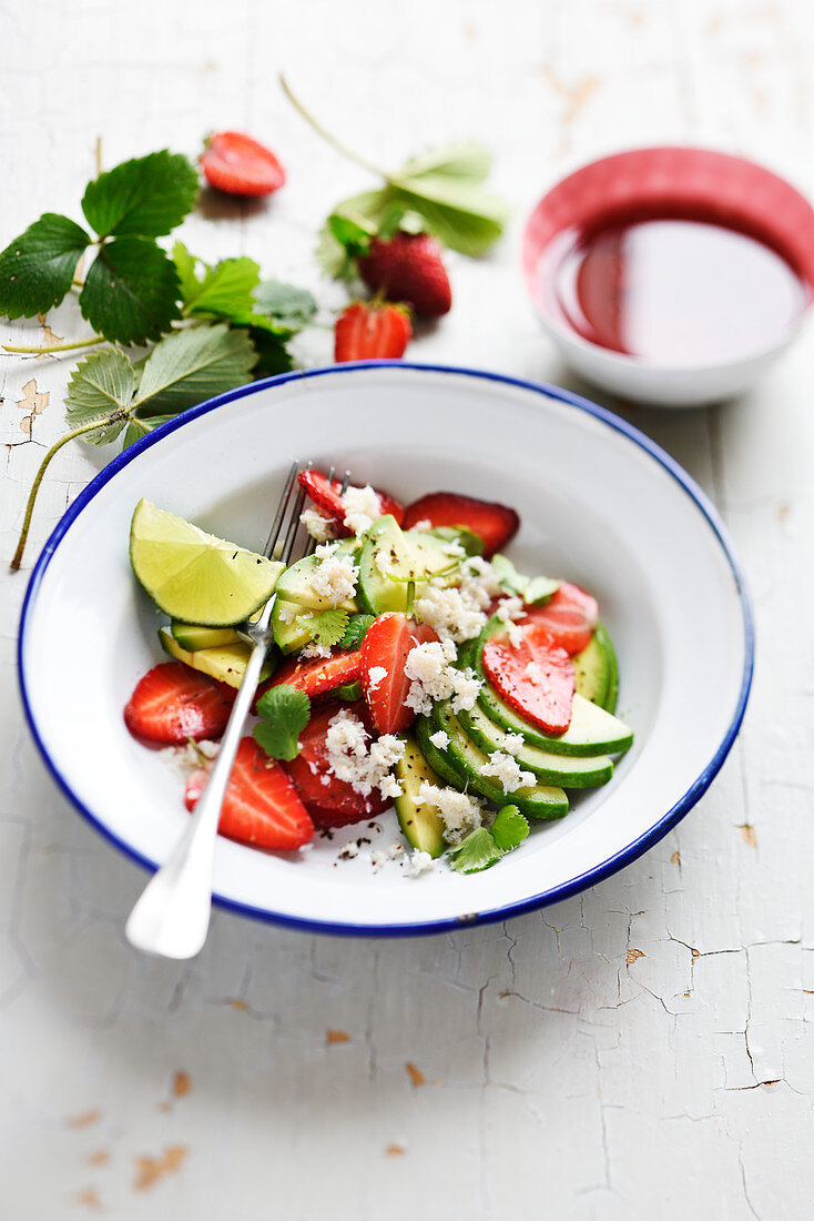 Strawberry fruit salad with avocado and flaked crab meat