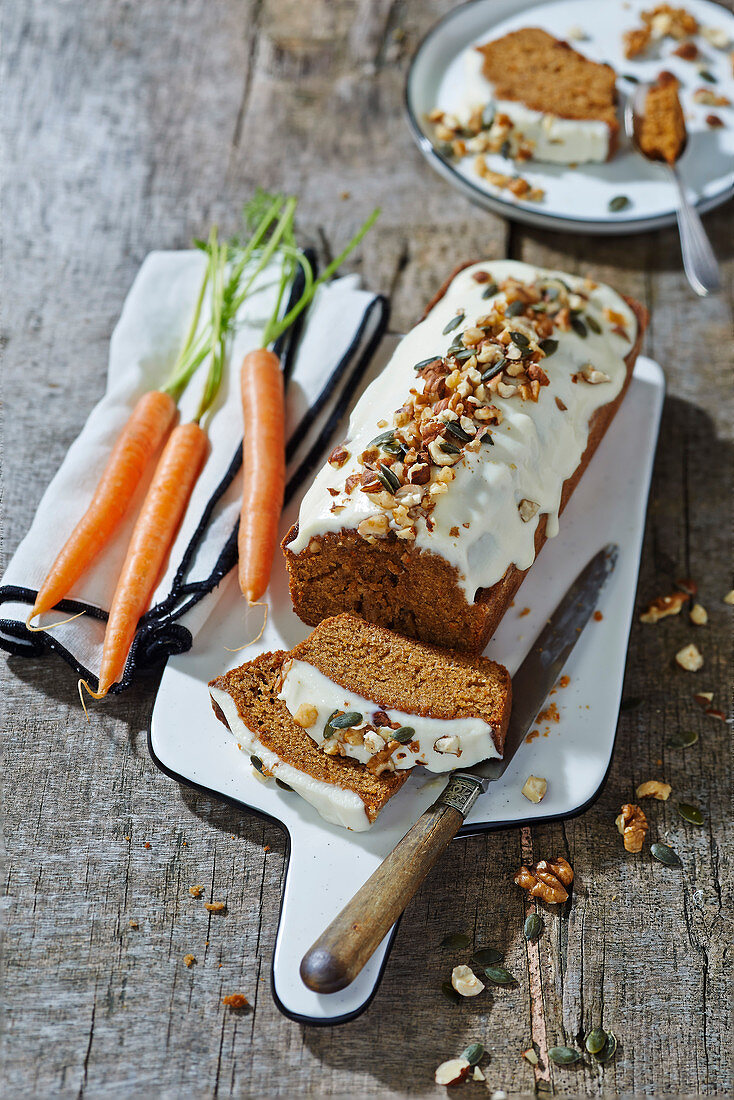 Organic carrot cake with dried fruit,nut and icing topping