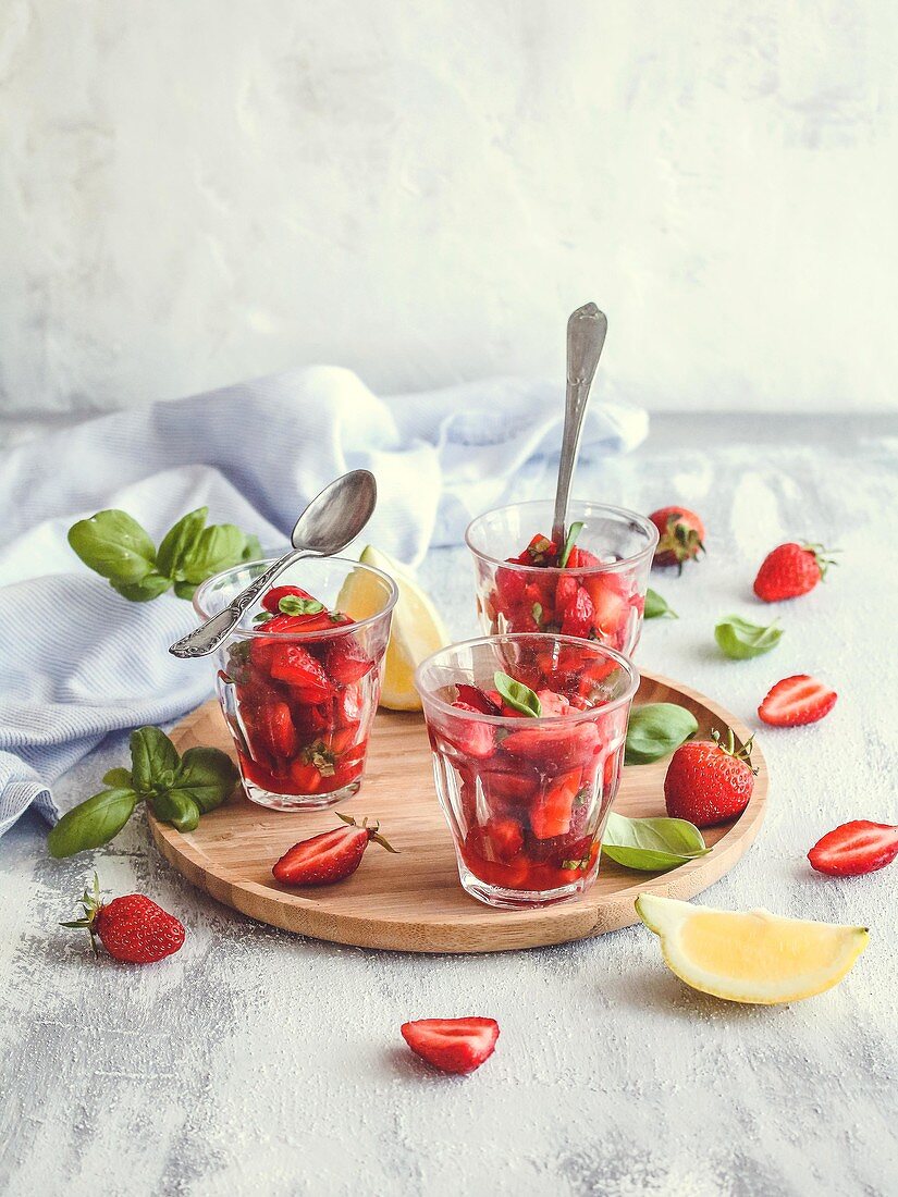 Strawberry fruit salad with basil and lemon