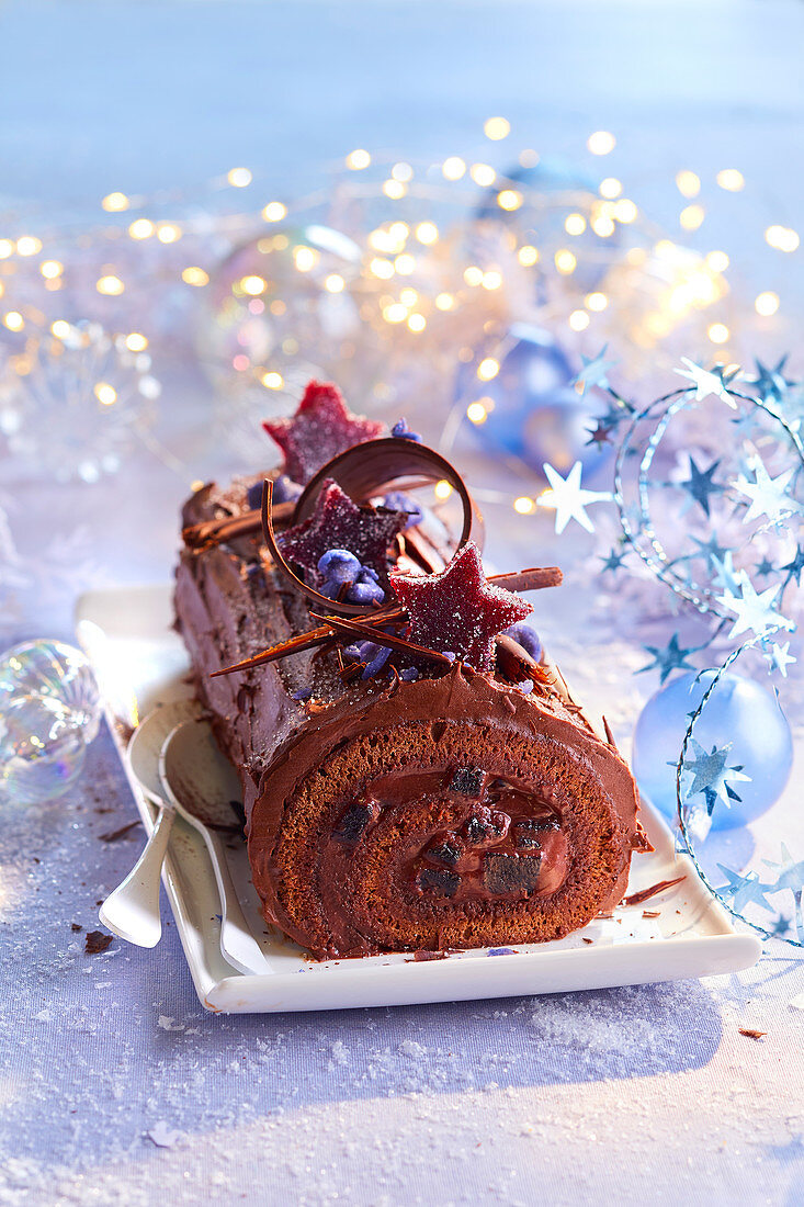 Chocolate and blackcurrant log cake