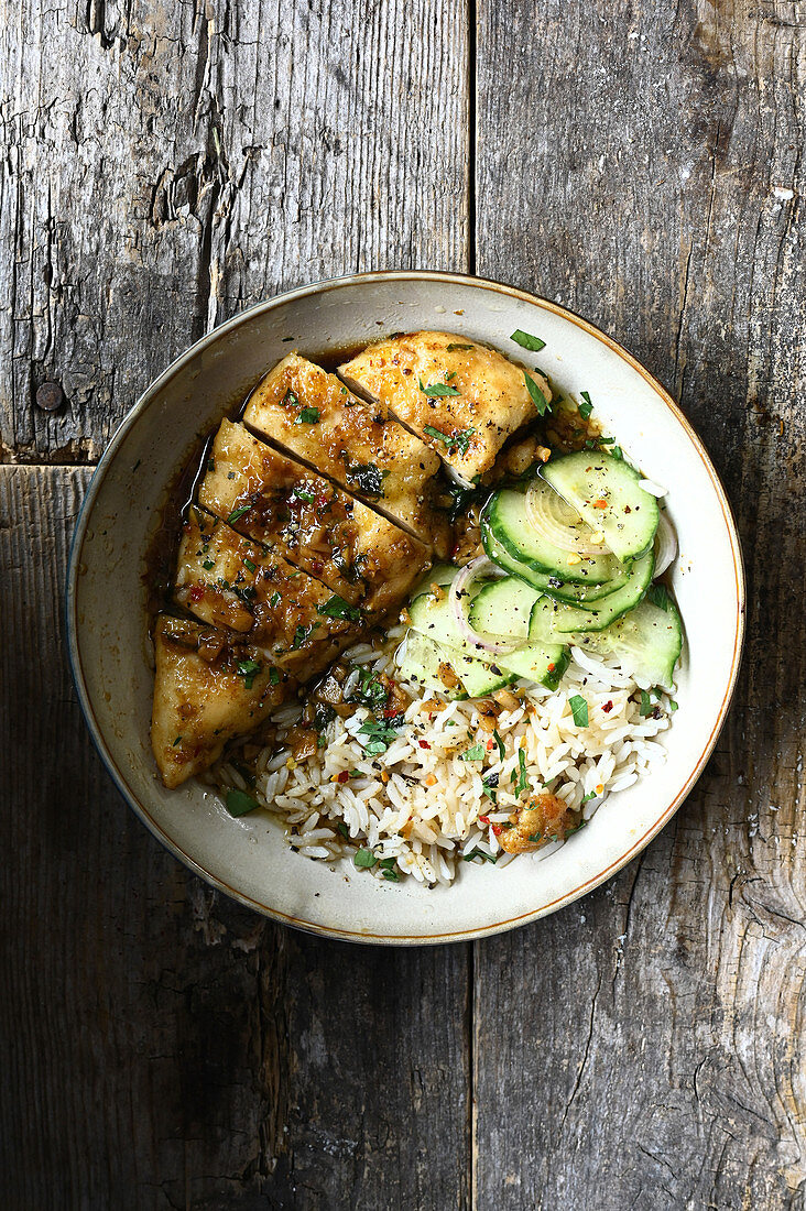 Chicken beast with honey and garlic,rice and cucumber