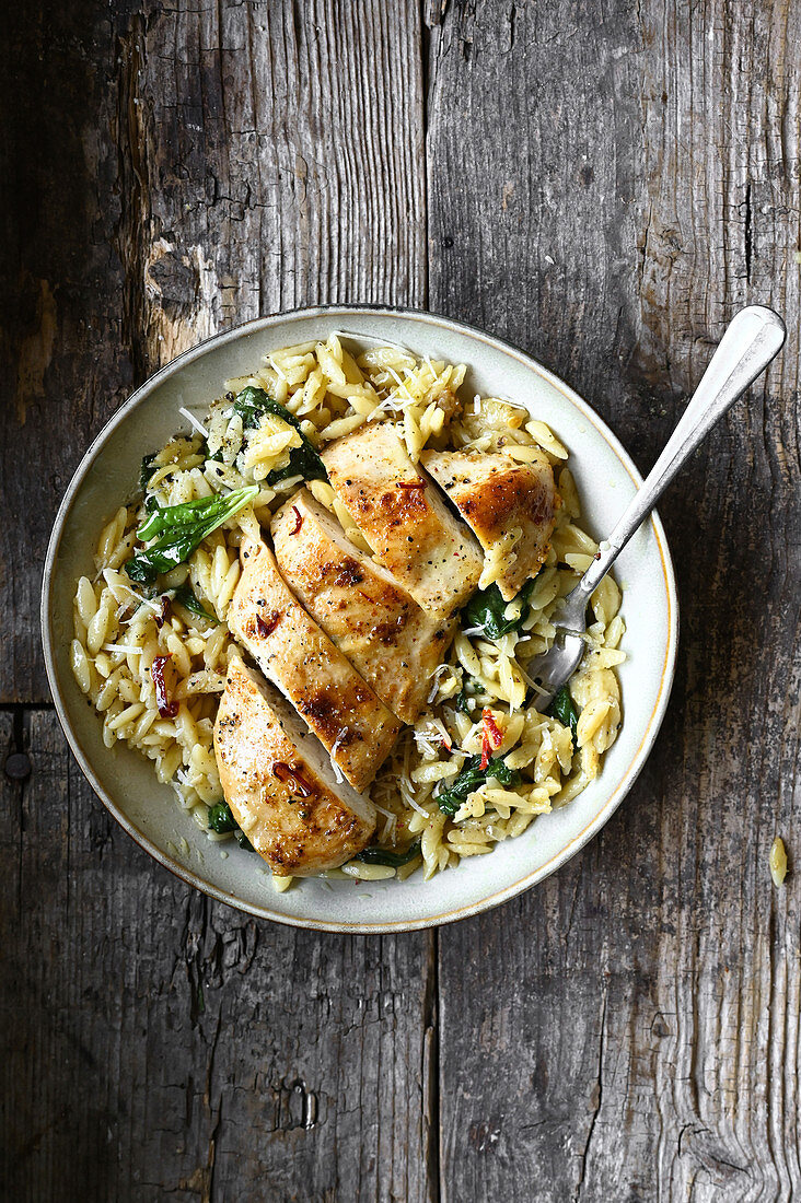 Chicken breast with orzo rice and parmesan