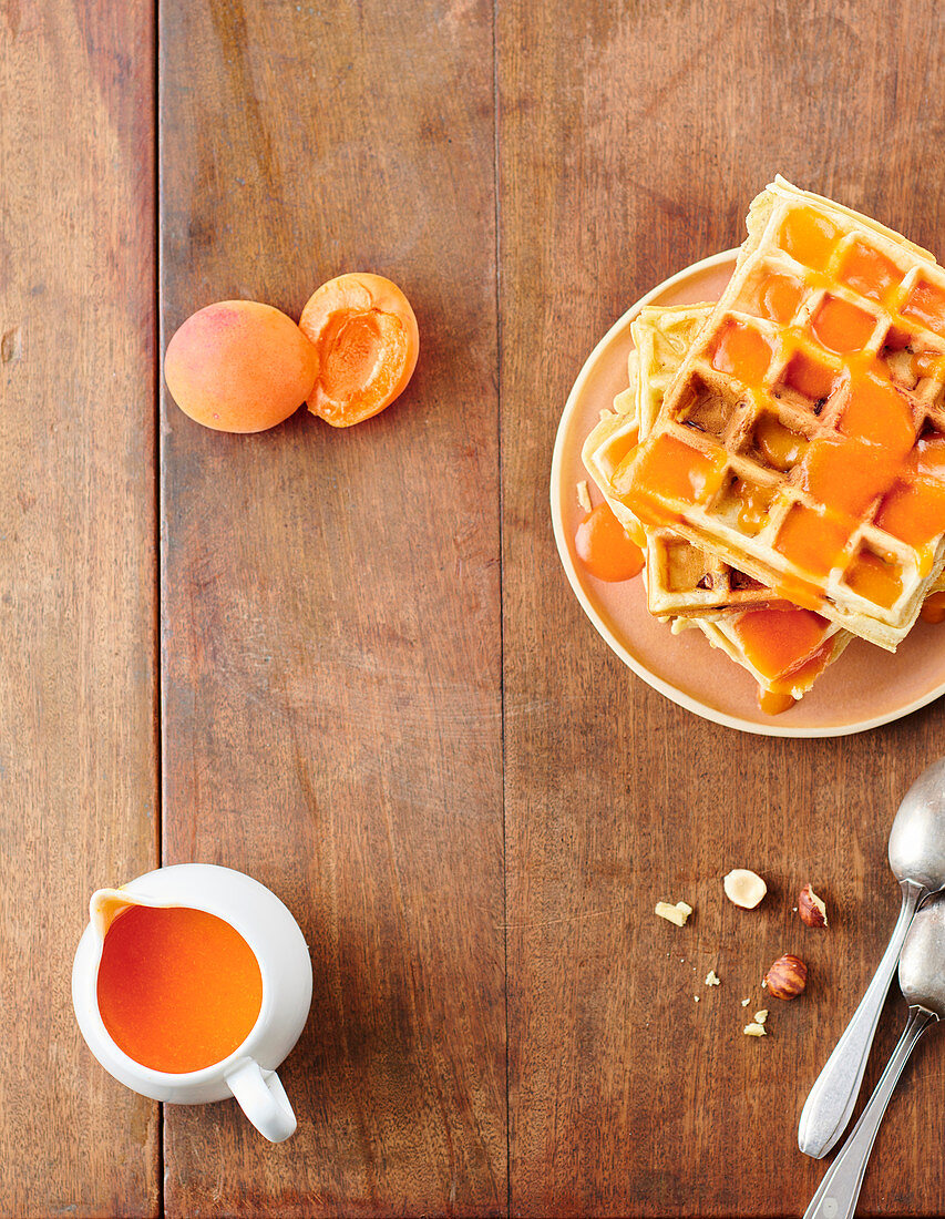 Waffles with hazelnuts, almonds and apricot coulis
