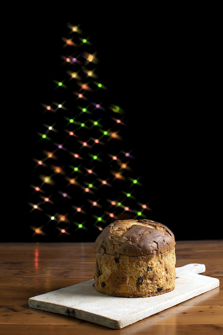 Traditional italian panettone with Christmas decorations.