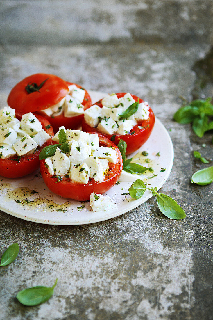 Tomatoes stuffed with caprese