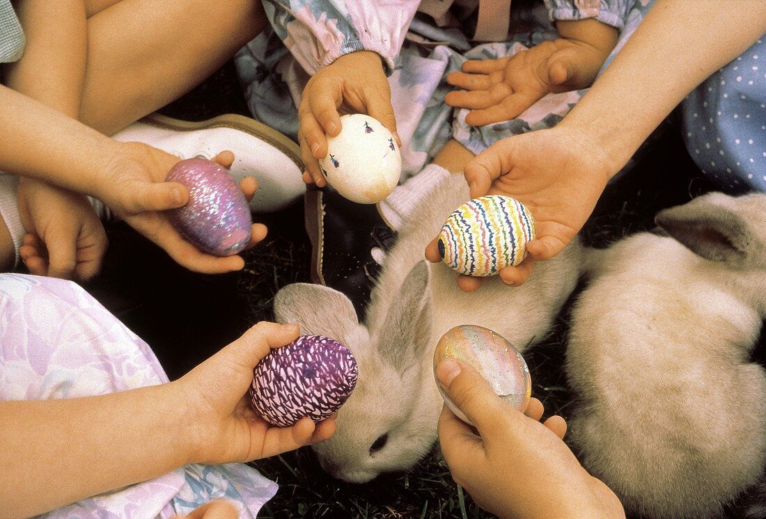 Children Holding Colorful Easter Eggs