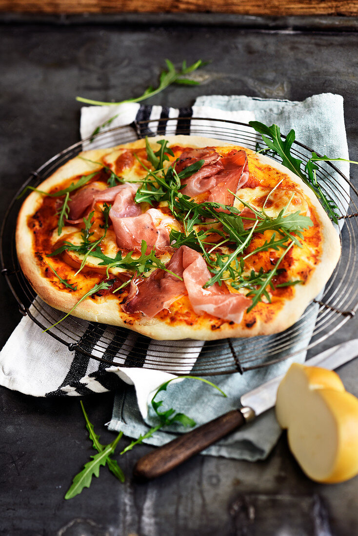 Smoked Scamorza,speck and rocket lettuce pizza