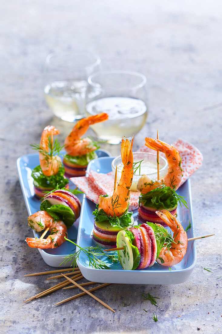 Aperitif skewers with shrimp and small tian of vegetables