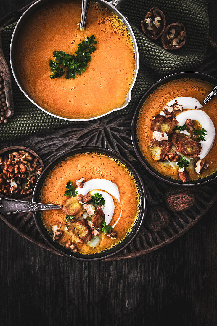 Squash soup with walnuts
