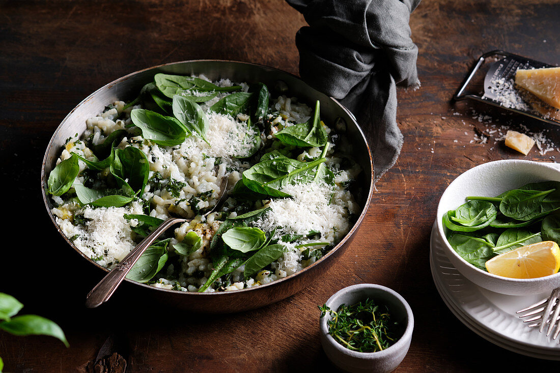 An oven-baked risotto made with short grain rice, chopped kale, spinach, lemon zest and grated cheese