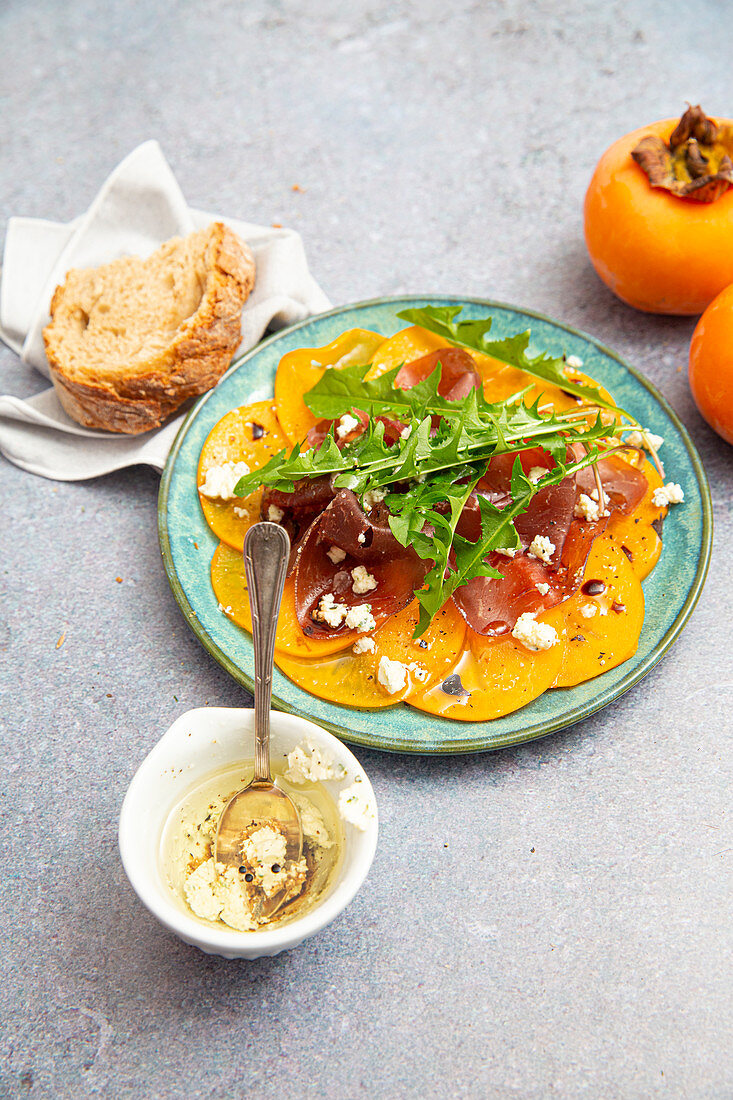 Persimmon carpaccio, beef jerky, dandelion and Boursin vinaigrette