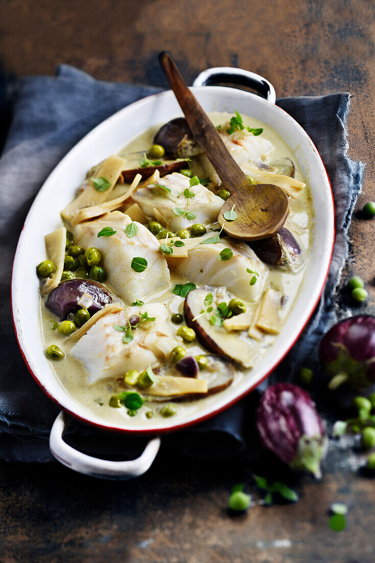 Cod with green curry, eggplant, bamboo shoots and peas