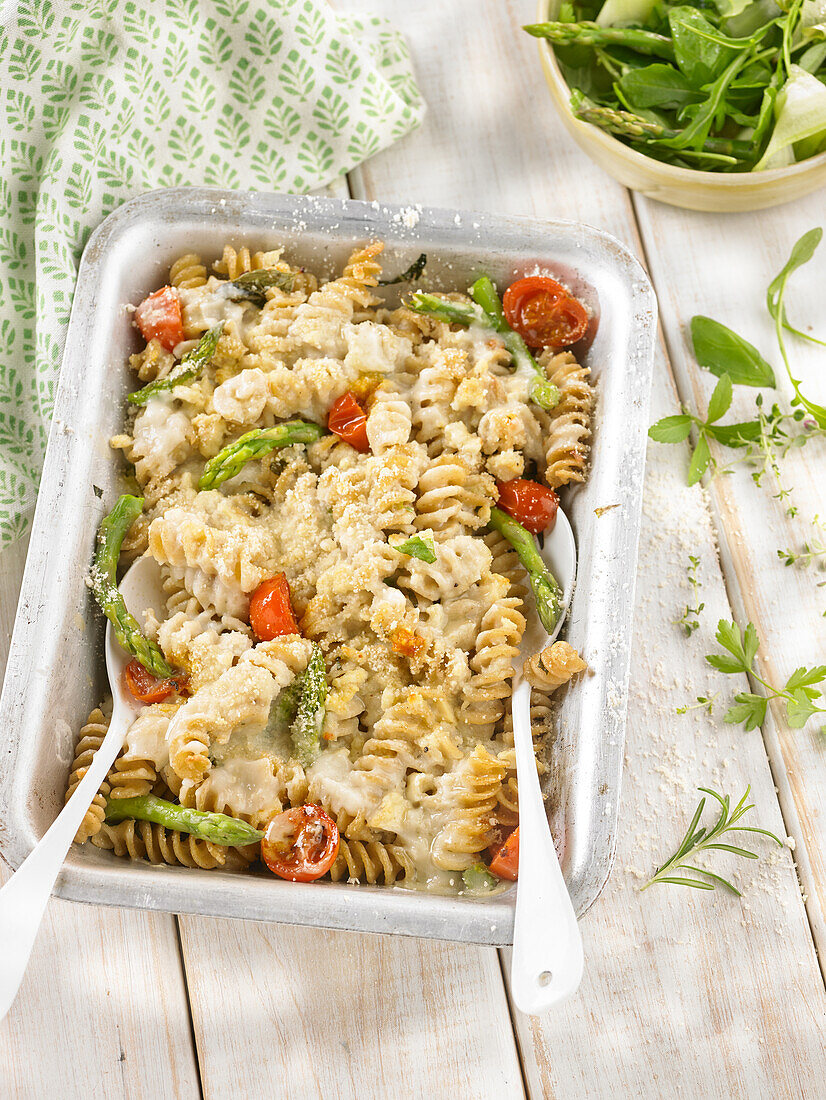 Fusilli with asparagus, cherry tomatoes and cauliflower béchamel