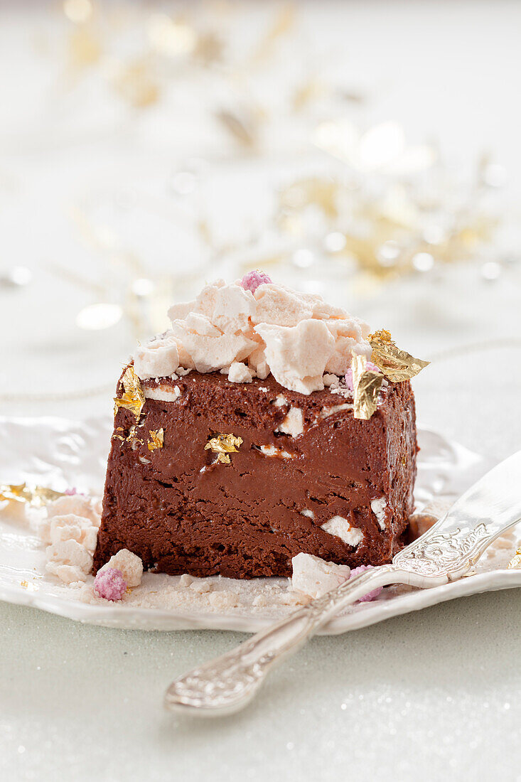 Chocolate semifreddo with meringue and gold leaf (Christmas)