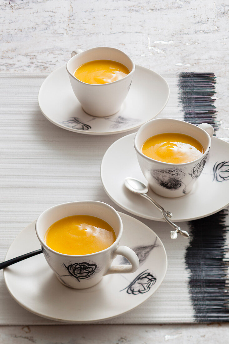 Citrus fruit soup in cups