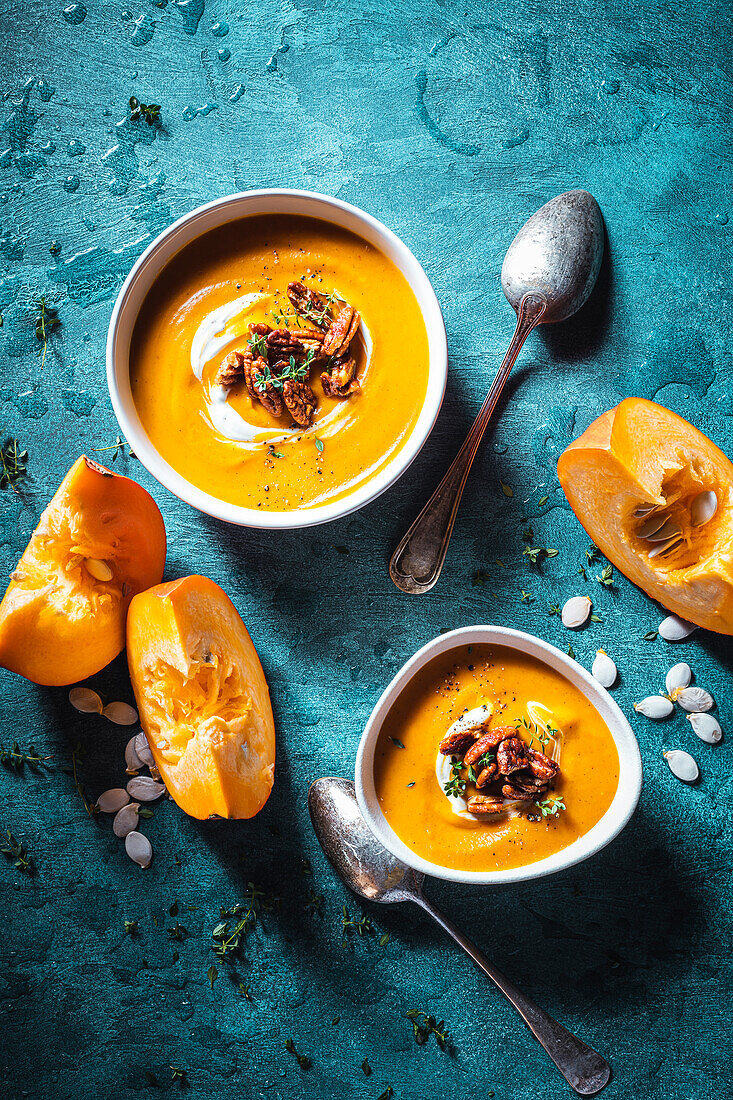 Pumpkin soup with harissa and caramelised pecan nuts