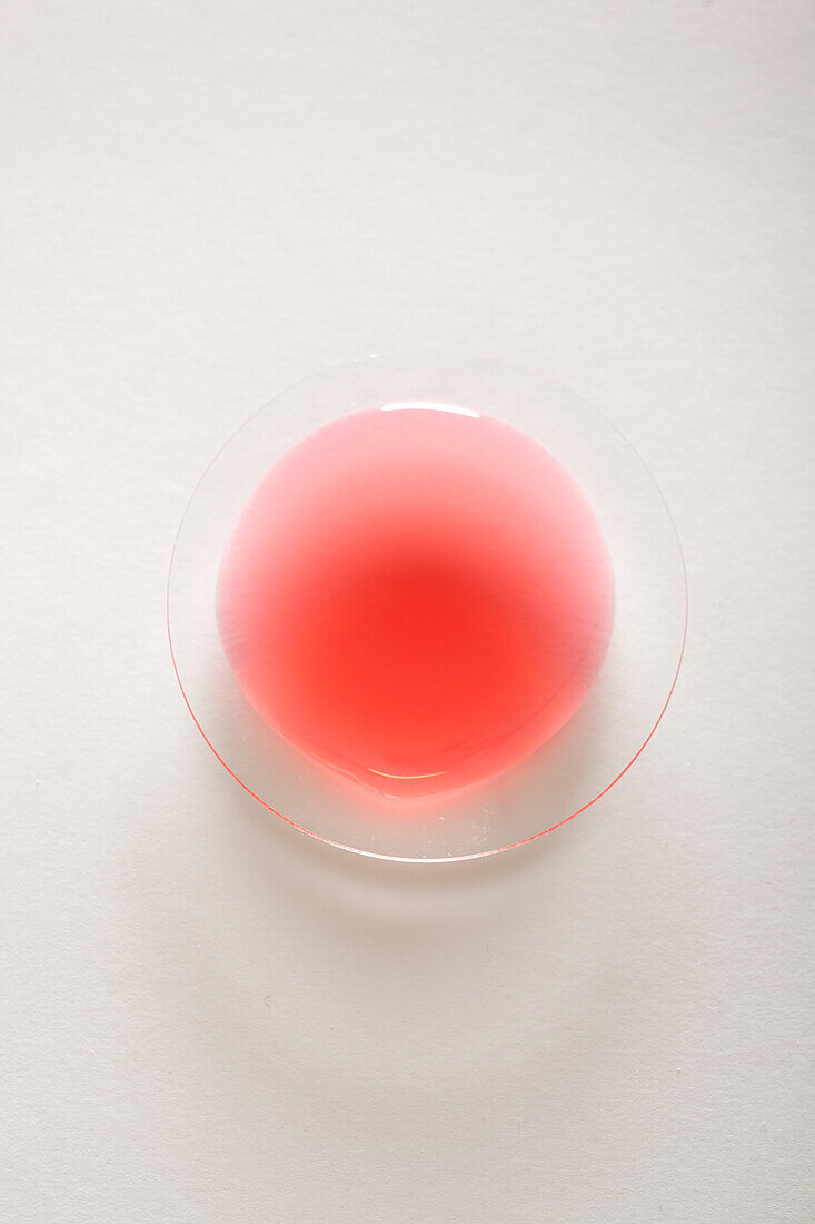 Poppy blossom syrup in a glass bowl