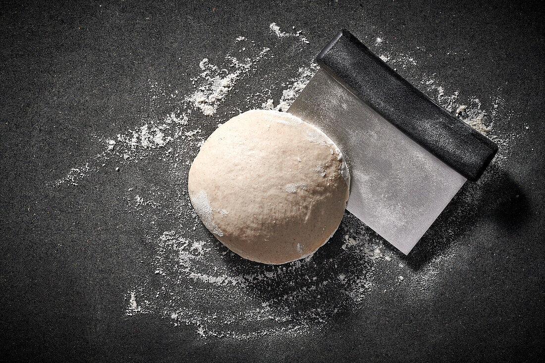 Pizza dough formed into a ball