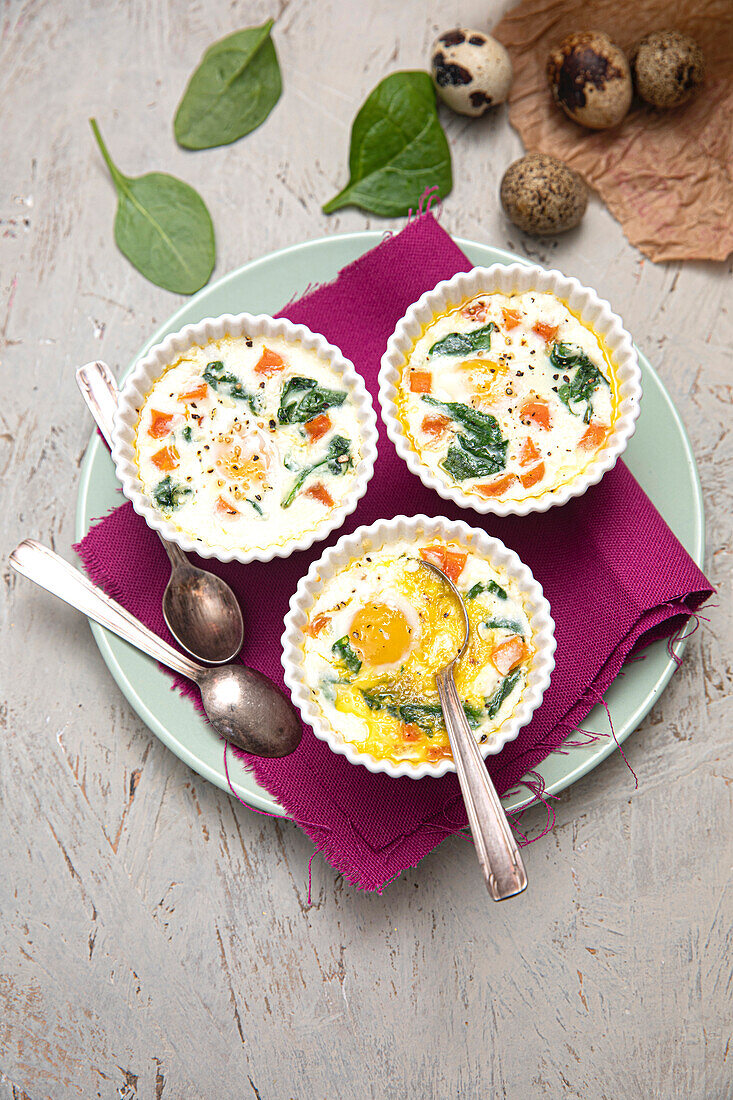 Quail scrambled eggs with ricotta, carrots and spinach (vegetarian)