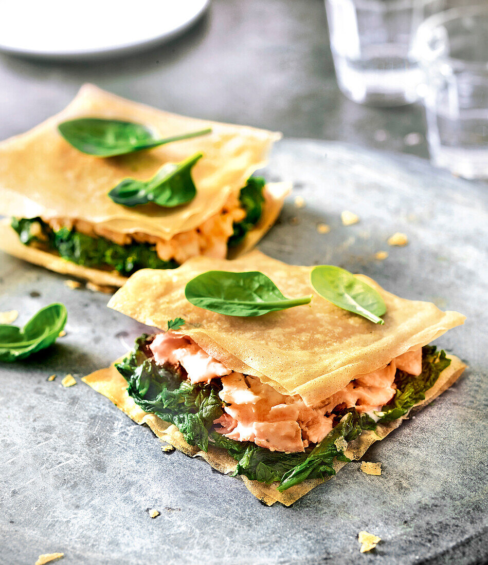 Mille Feuille with salmon, spinach and pine nuts