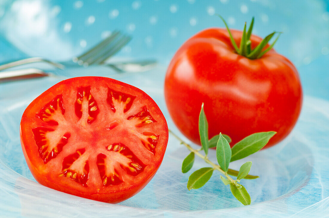 Tomatoes, whole and halved