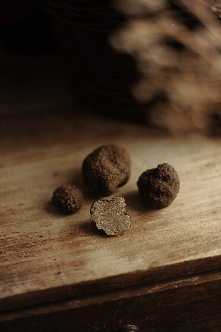 Fresh truffles on a wooden background