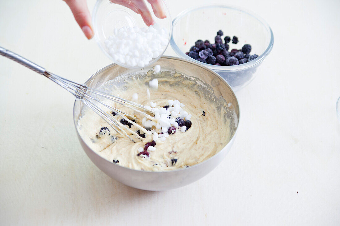Mixing the batter for Blackberry Muffins