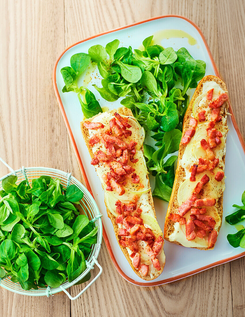 Cheese and diced bacon baguette toasts