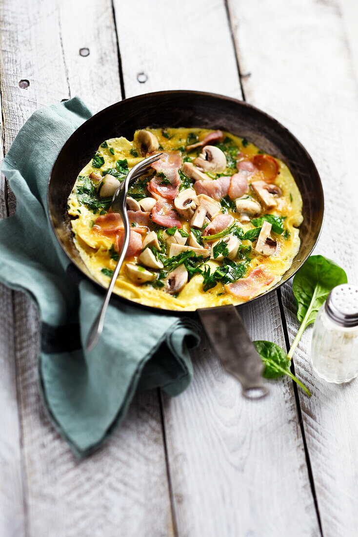 Mushroom,streaky bacon and spinach omelette