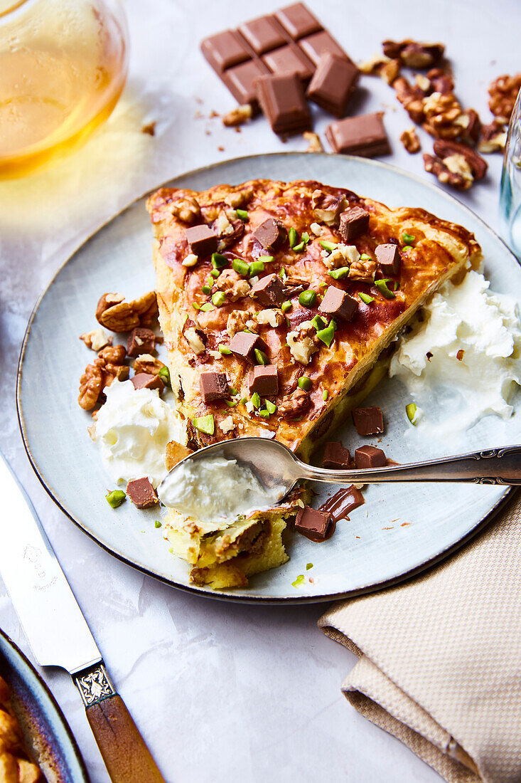 Galette de Rois with chocolate, walnut, pistachio and whipped cream