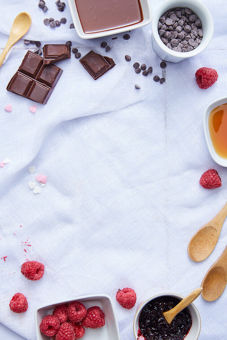 Ingredients for chocolate waffles with raspberry ice cream