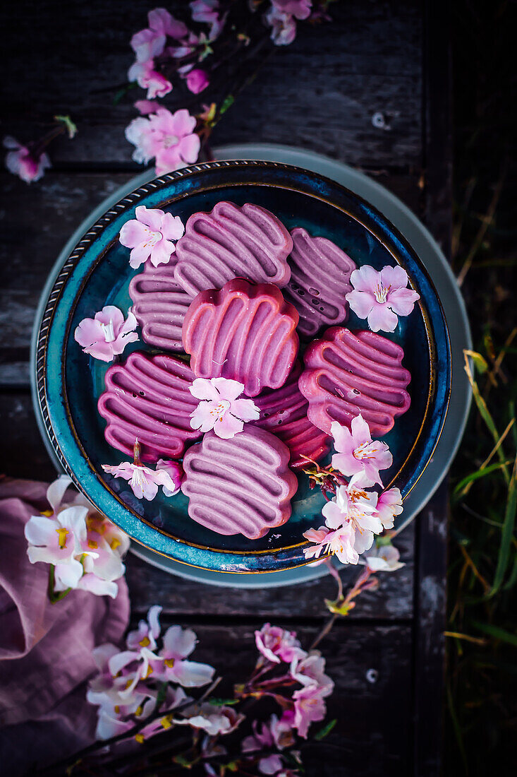 Ginger financiers coated with purple chocolate