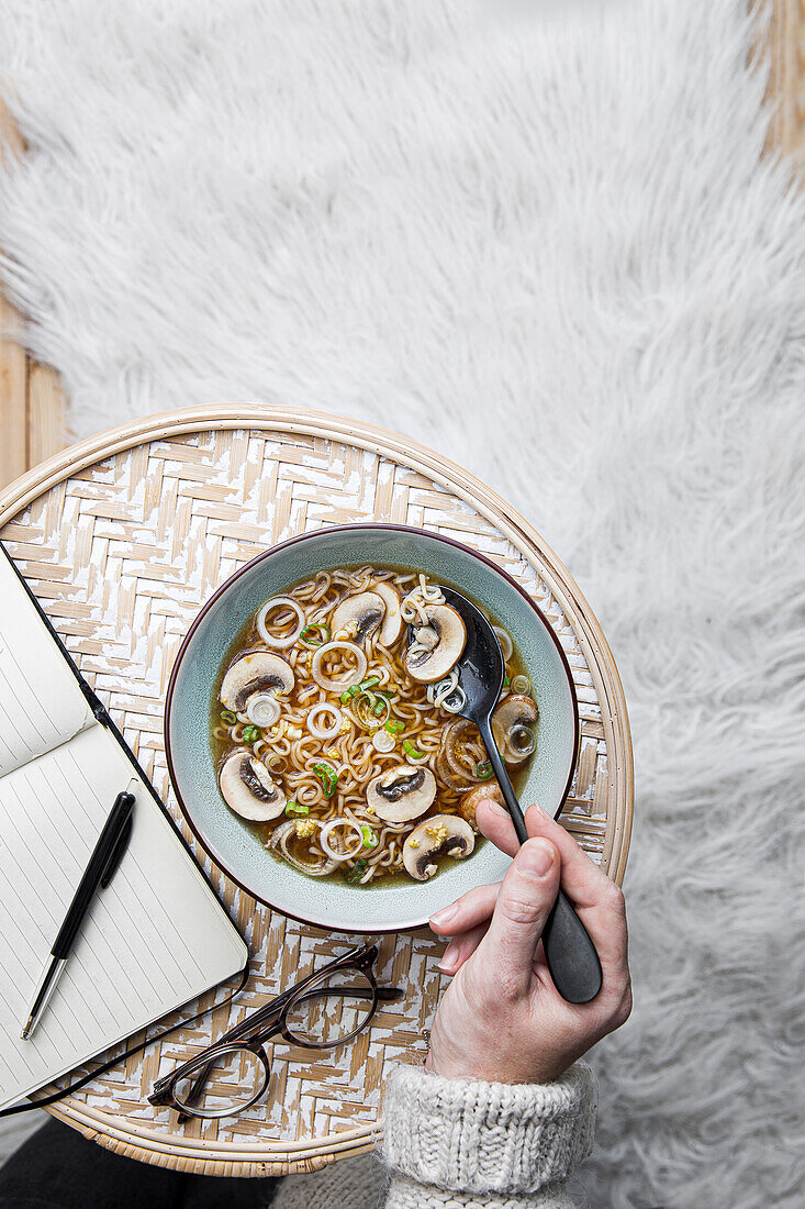 Asian noodle soup with mushrooms