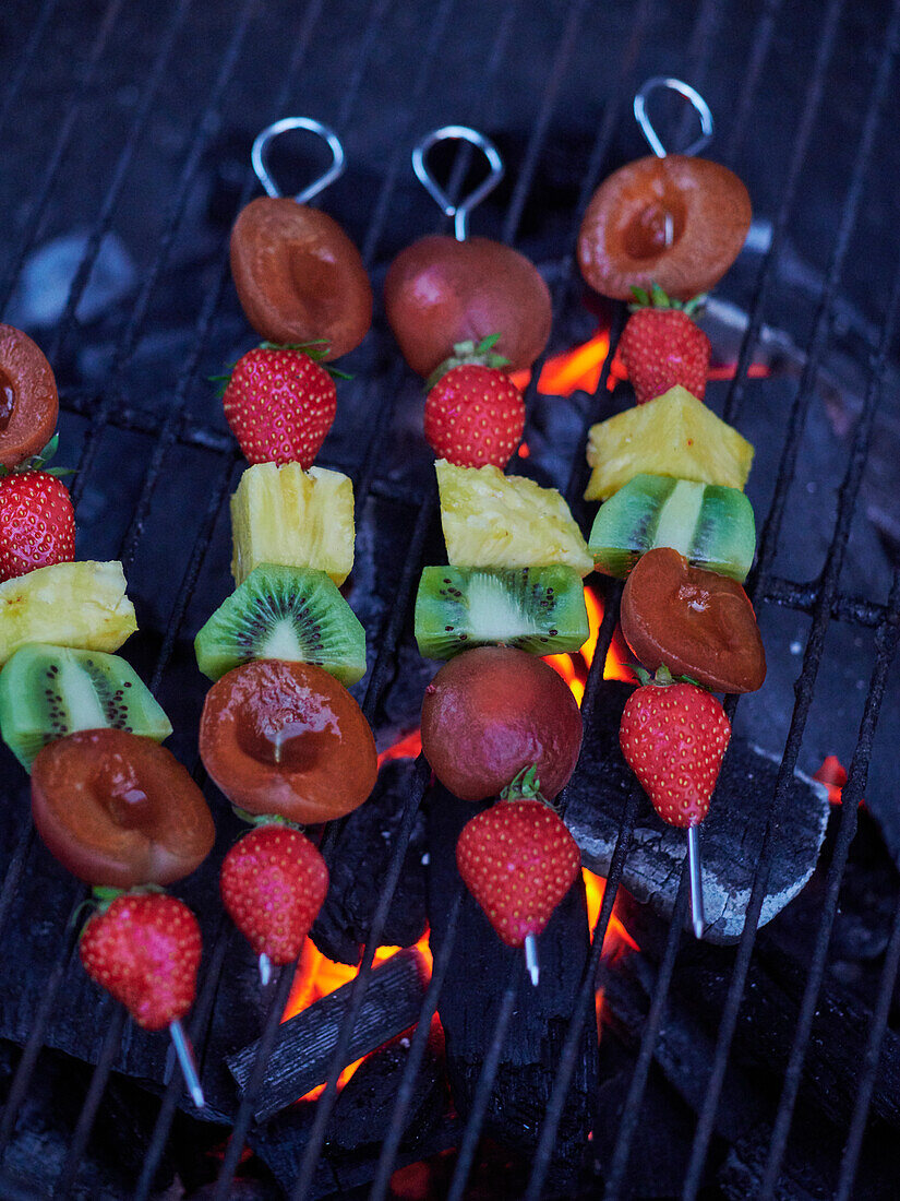 Fruit skewers on the grill