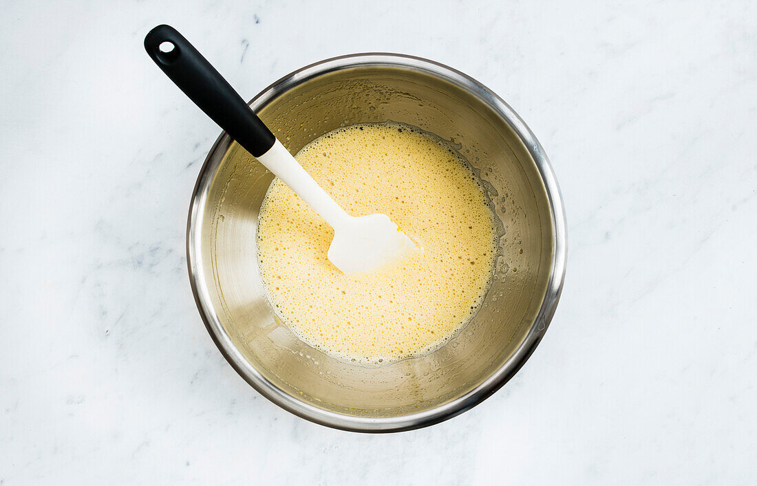 Making the cream for a chocolate-vanilla naked cake