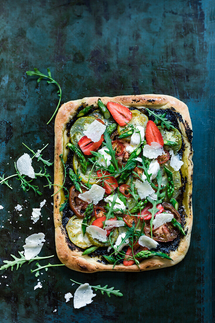 Tapenade,tomato,strawberry and parmesan pizza