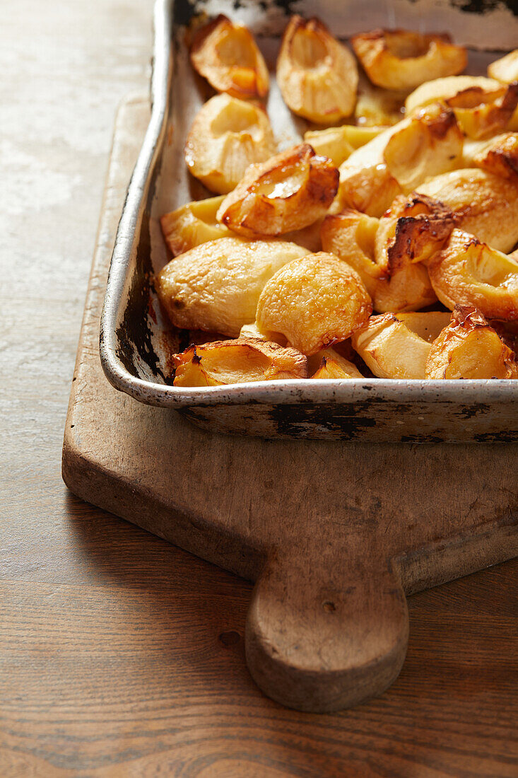 Golden brown baked apple slices from the oven