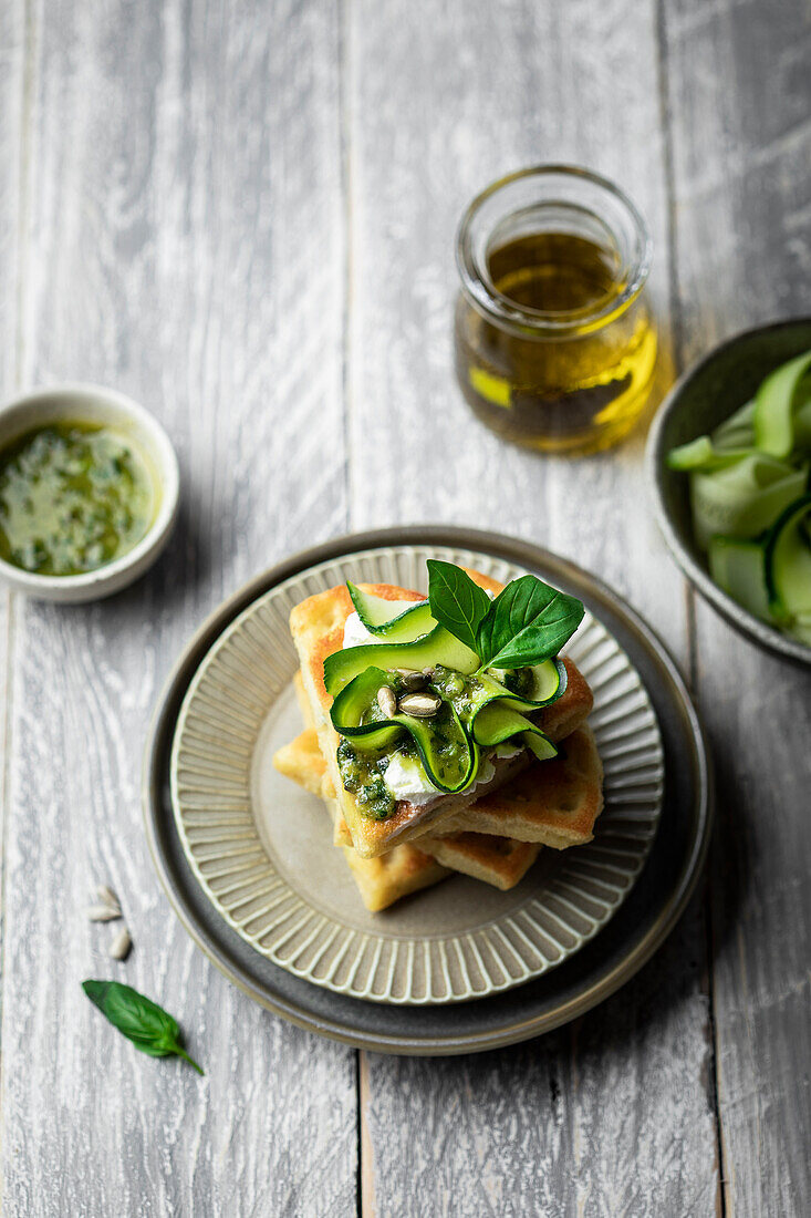 Waffles with courgette, goat's cheese and pesto