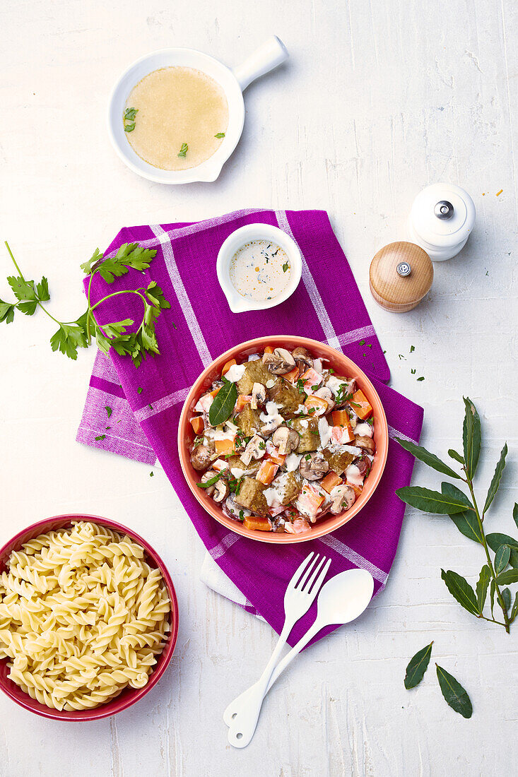 Fusilli with seitan, carrots and mushrooms