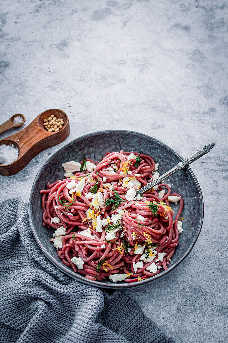 Beetroot bigoli with feta and lemon sauce