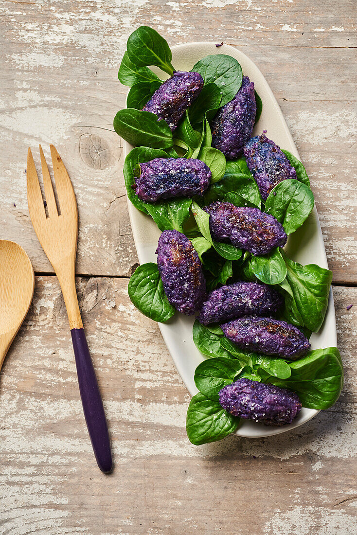 Purple dumplings made from Vitelotte potatoes and purple cauliflower