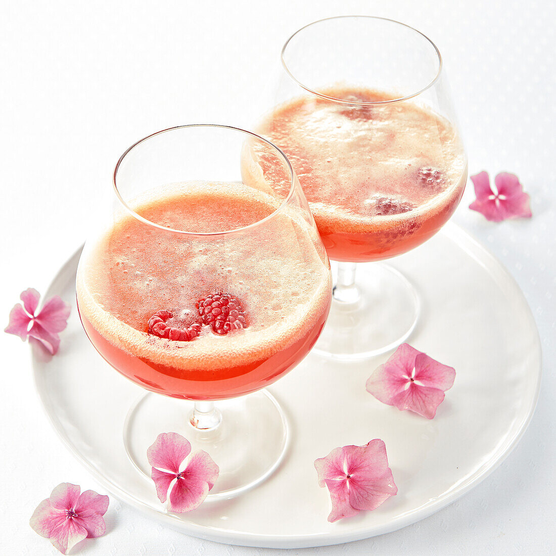 Cider and raspberry cocktail