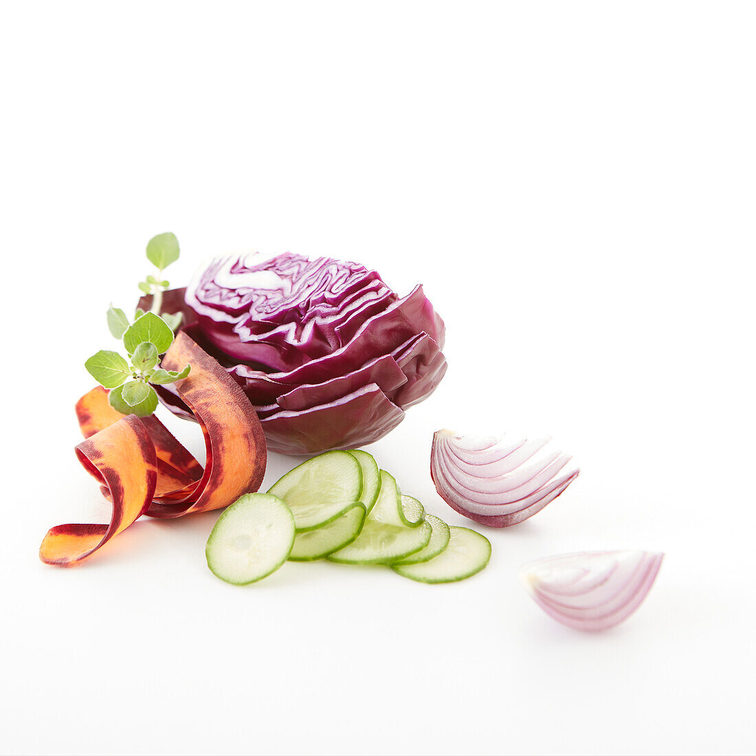 Red cabbage, cucumber, purple carrot and red onion