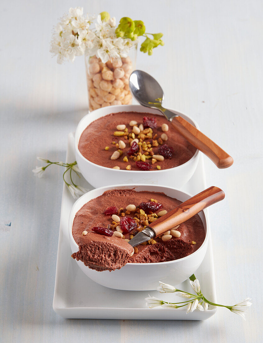 Chocolate mousse with chickpeas, goji berries, pine nuts and pistachios