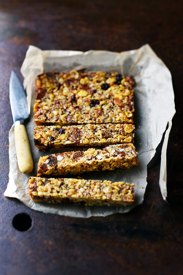 Energy bar with almonds, figs, honey, cornflakes and sunflower seeds