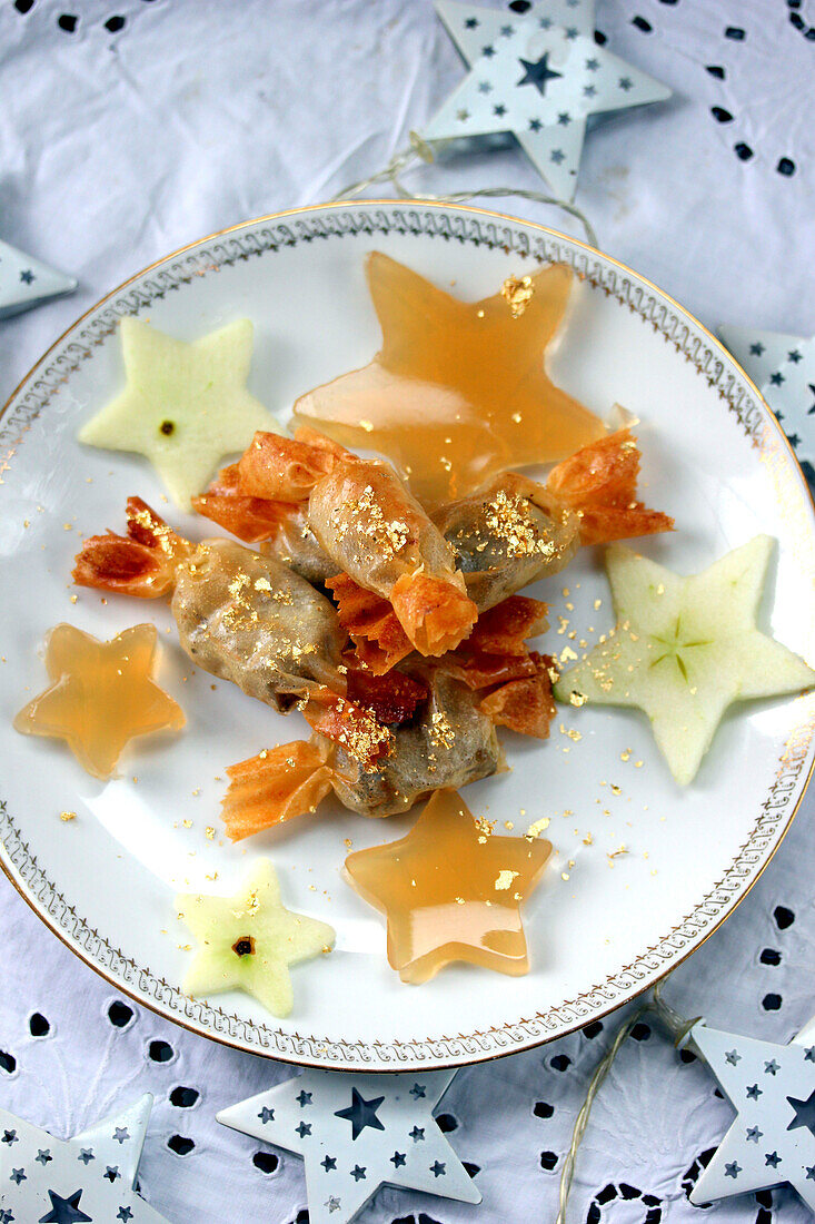 Christmas sweets made from foie gras with jelly and apple stars