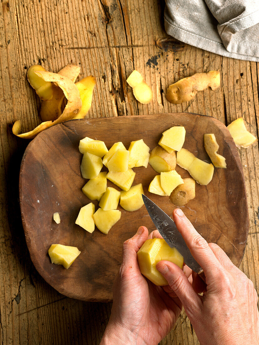 Peeling potatoes