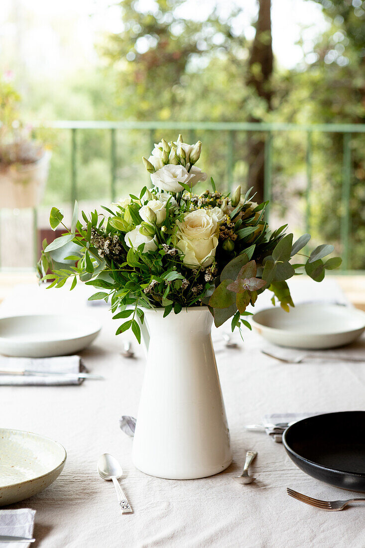Bouquet with white flowers as a table decoration