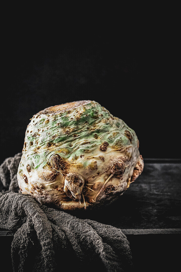 Celeriac against a black background